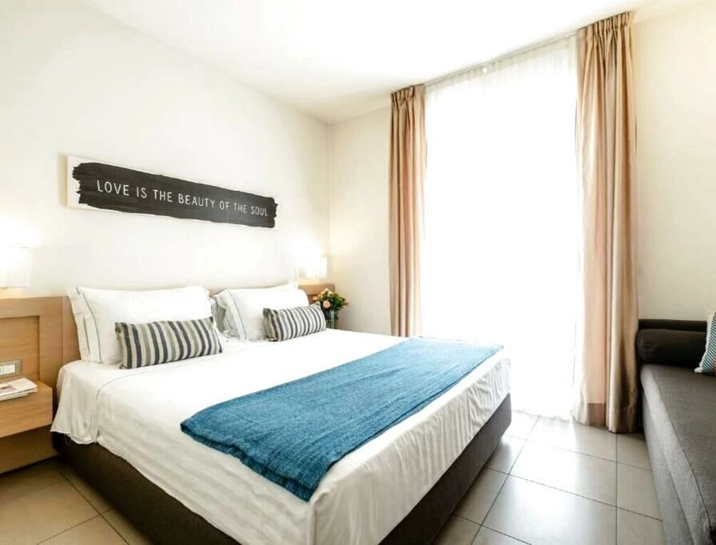 Afbeelding gerelateerd aan Le Rose Suite Hotel