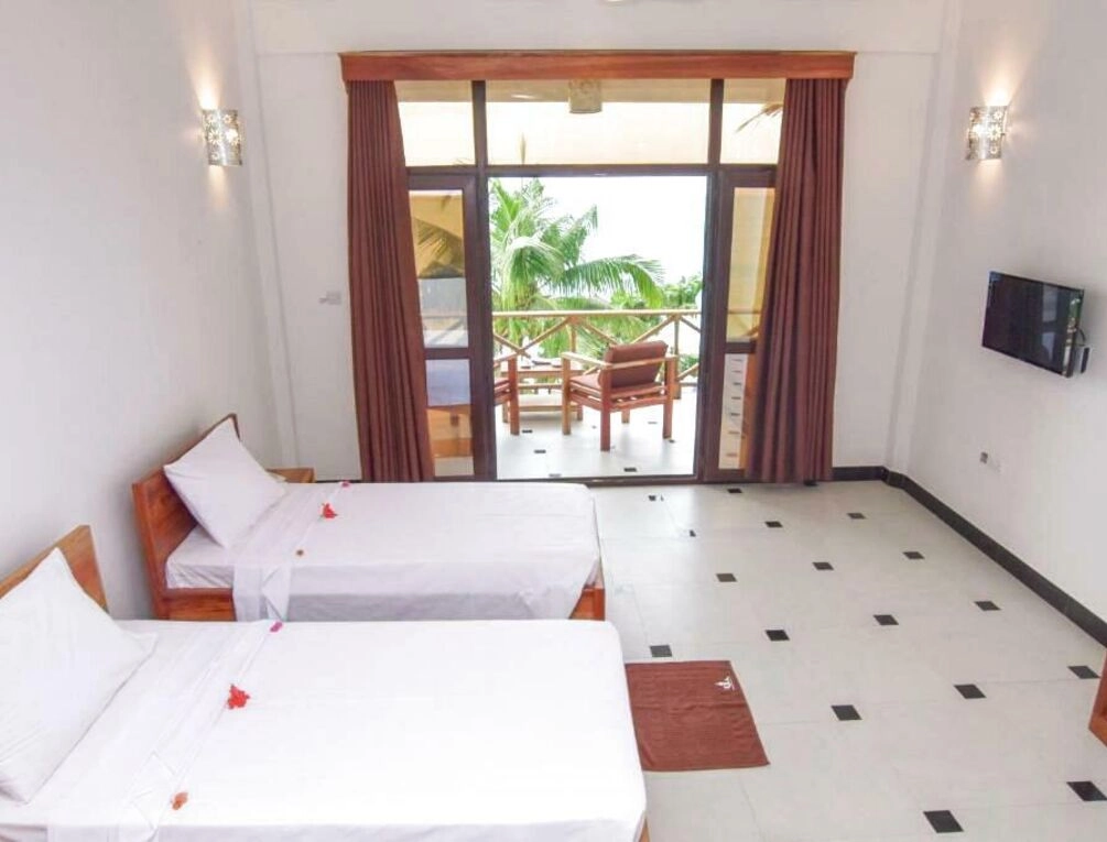 Afbeelding gerelateerd aan Mnarani Beach Cottages