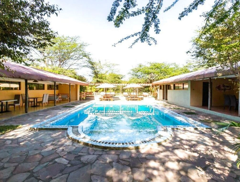 Afbeelding gerelateerd aan PrideInn Mara Camp & Cottages